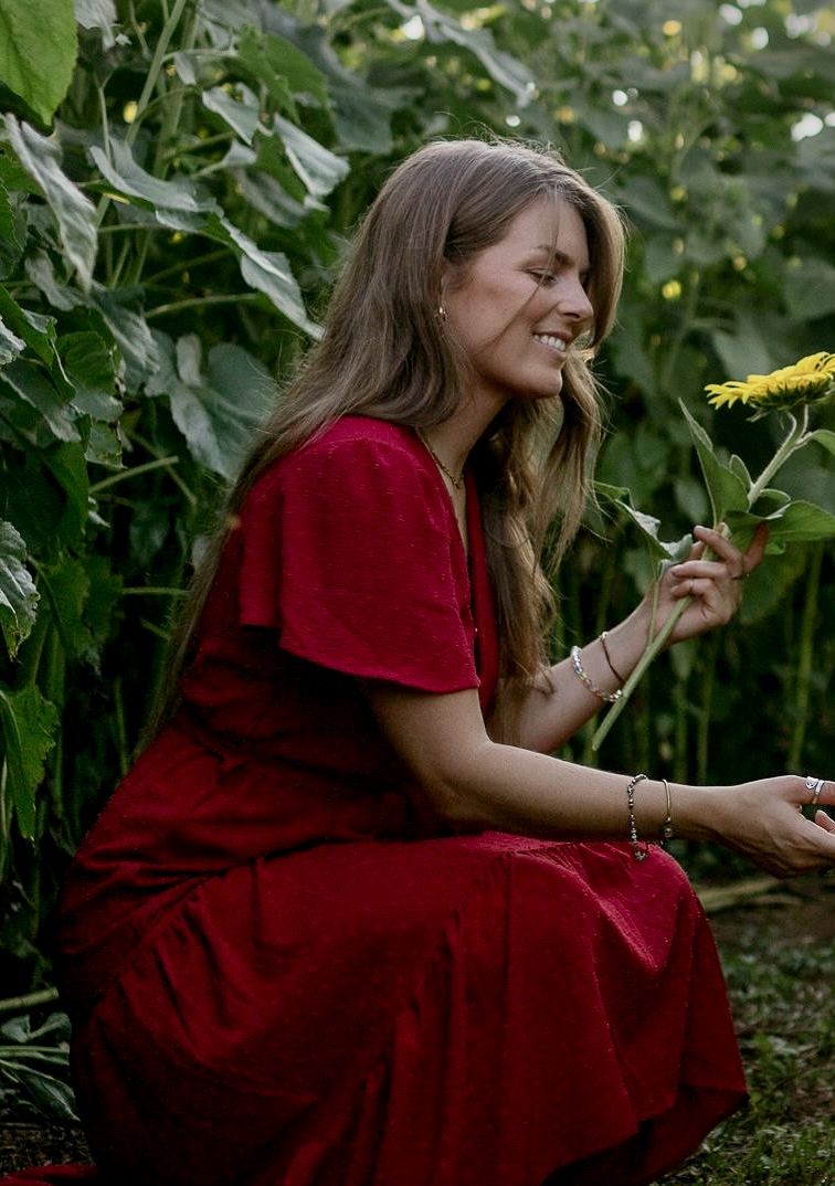 Paige among sunflowers